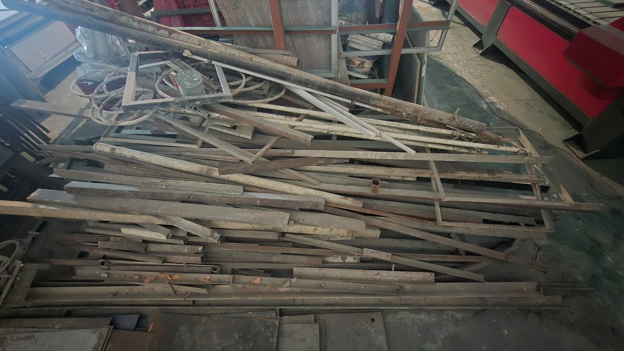 Metal frames and pipes in New Malvi Scrap Center's gallery